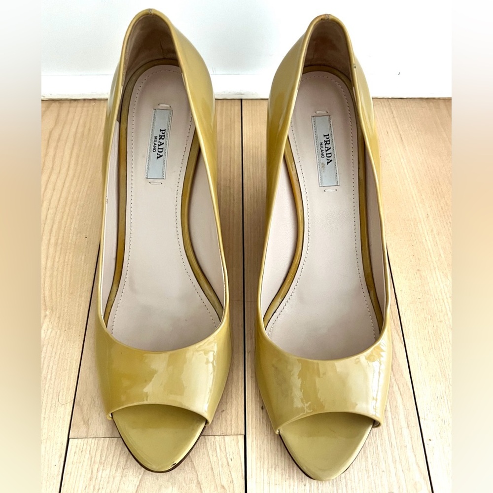 Eye catching Prada wedge heels in a gorgeous yellow, patent leather